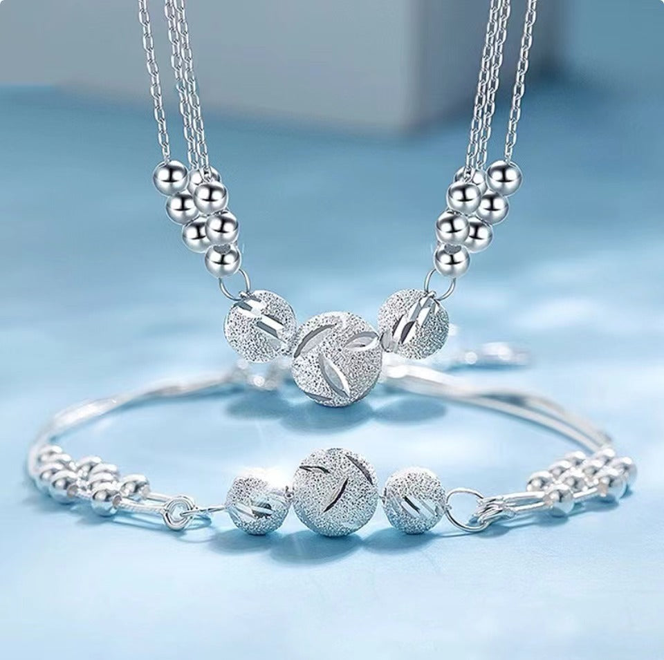 Nakit set ogrlica i narukvica s dizajnom