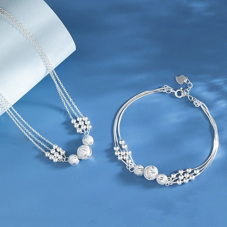 Nakit set ogrlica i narukvica s dizajnom